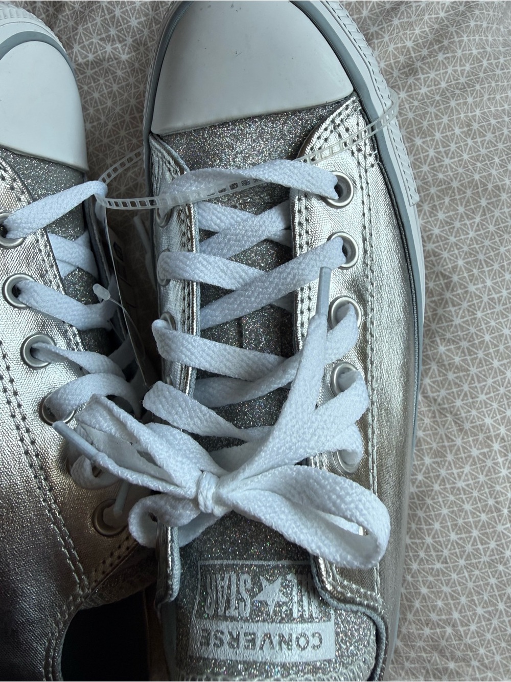 NWT Converse Low Top Sneakers in Metallic Silver with glitter tongues